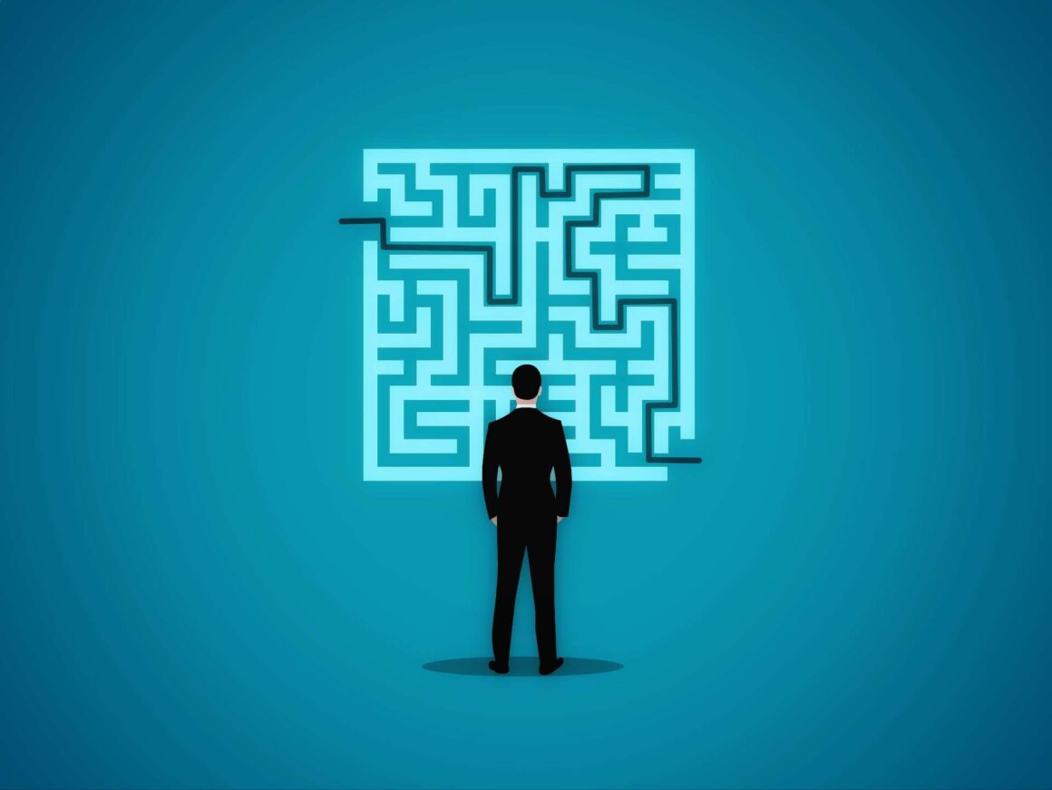 an entrepreneur staring at a maze