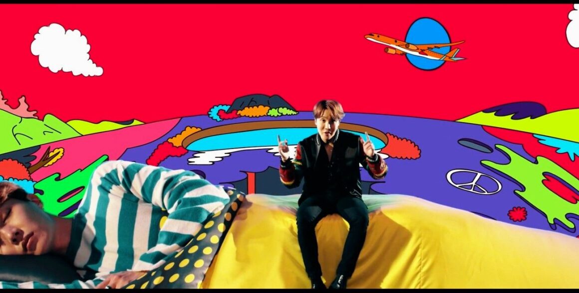 j-hope in a colorful and surreal scene from the “Daydream” MV.