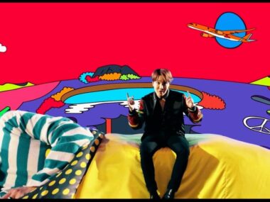 j-hope in a colorful and surreal scene from the “Daydream” MV.