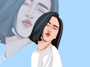An Asian woman blowing a kiss.
