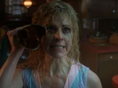 Karen Wheeler protecting her daughter Holly in Stranger Things 5