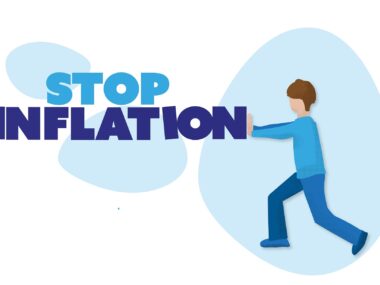a man pushing the words "stop inflation"