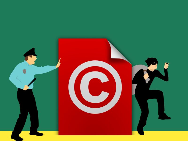 police officer catching a copyright thief