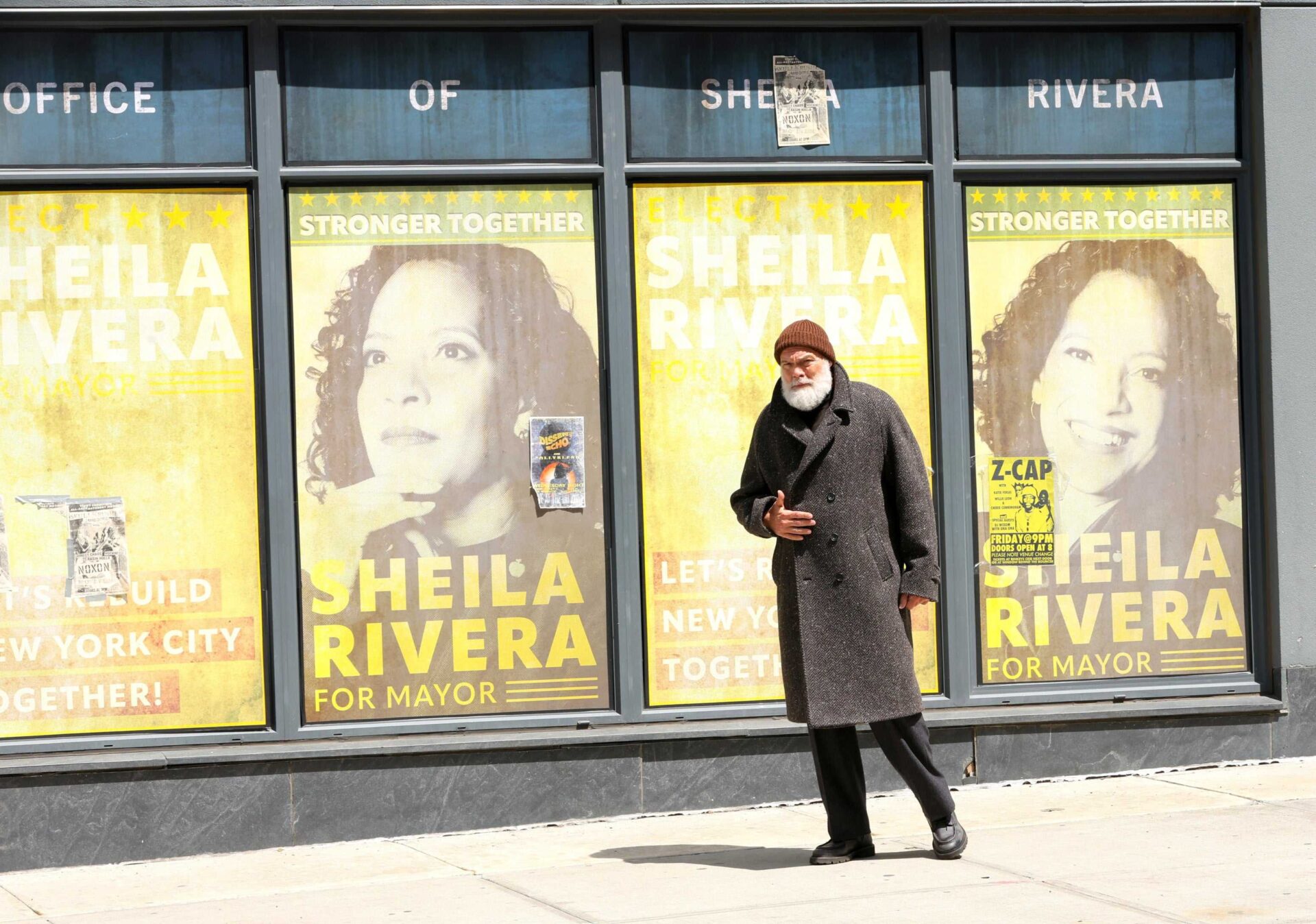 Fisk's actor Vincent D'Onofrio standing in front of campaign posters for Sheila Rivera while filming season 3 of Daredevil: Born Again. 