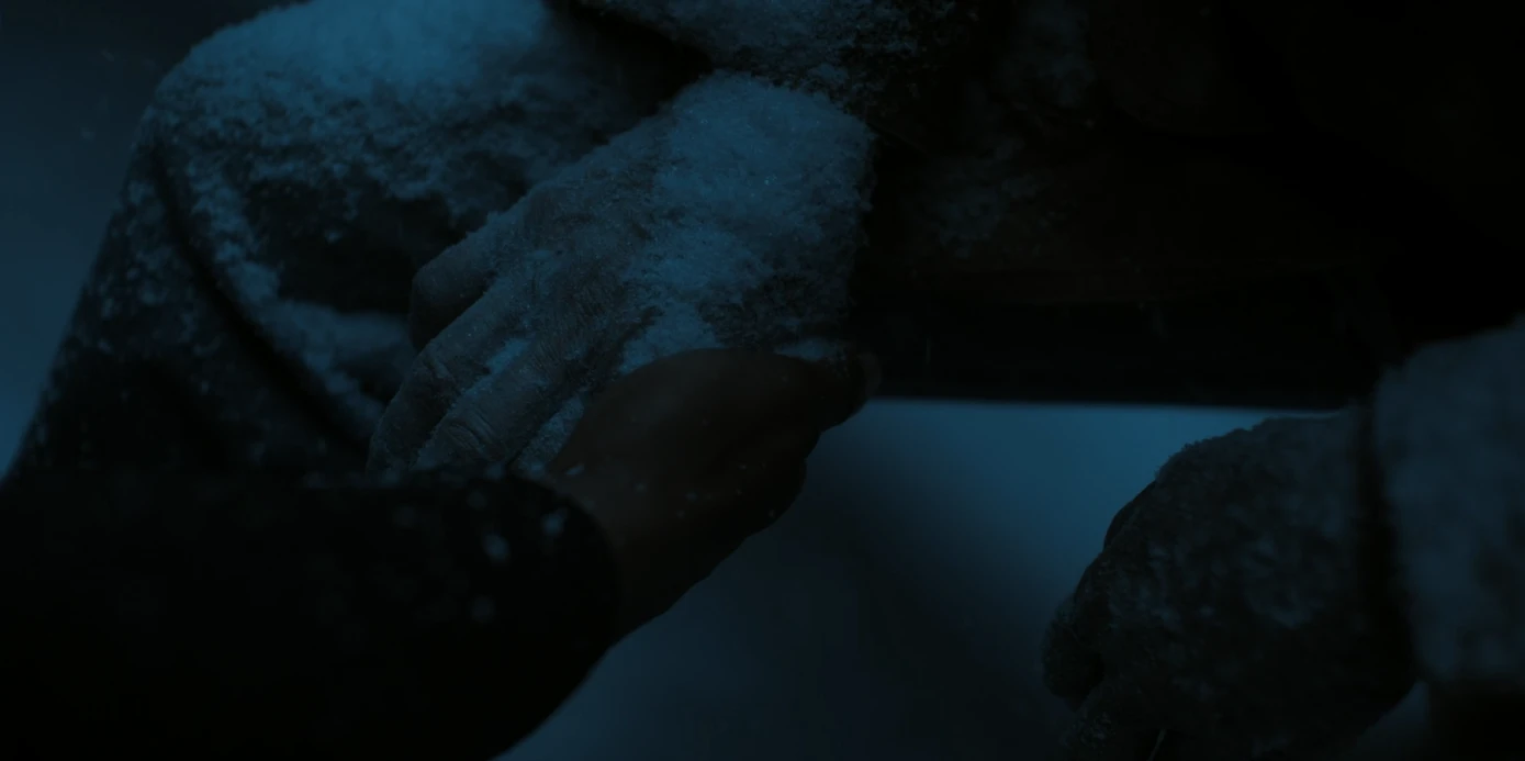 Hal’s empty hand after he dies in Lanterns